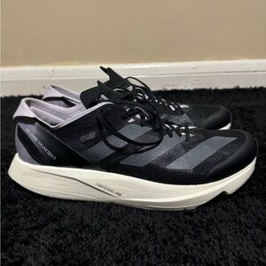 Adizero Takumi Sen 9
Black Night Metallic